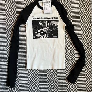 Long sleeve baseball style Brandy Melville Radio Silence tee. NWT.